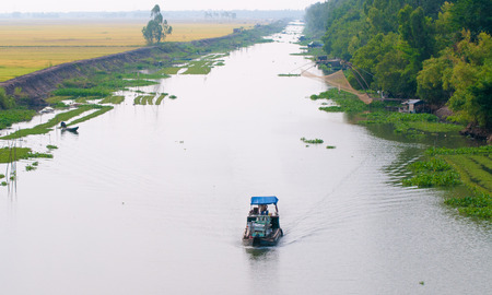The landscape of Saigon: Cargo boat floating on the Mekong river, southern Vietnam. Kho ảnh