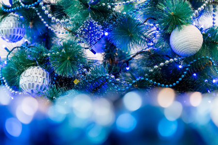 decorated christmas tree with blue lights white christmas ball and garland unfocused image in - Christmas Tree With Blue Lights decorated christmas tree with blue lights white christmas ball and garland unfocused image in - Christmas Tree With Blue Lights