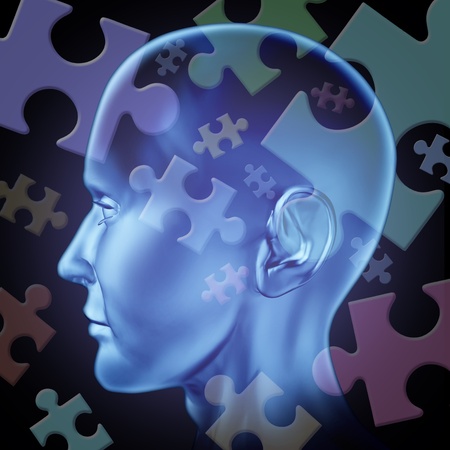alzheimers: Puzzled mind and brain teasers symbol featuring a human head with jigsaw puzzle peices representing the concept of riddles of thinking and problem solving to find a solution and answers to mysteries of the brain. Stock Photo