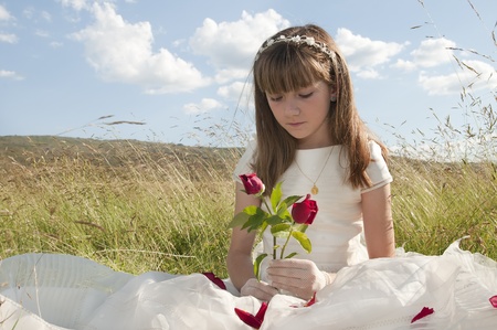 La comunión vestido de niña en la pradera