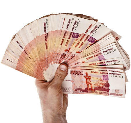 http://us.123rf.com/450wm/madllen/madllen1406/madllen140600832/29514872-fan-of-one-million-banknotes-rubles-of-the-russian-federation-in-man-hand--isolated-on-white-backgro.jpg