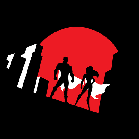 Superhero couple watching over the city from the roof of a tall building at night. Banco de Imagens