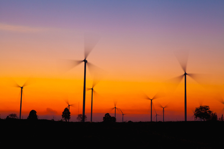 Windmill silhouette on suset background - 72392816