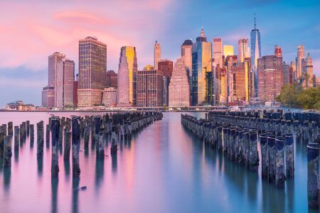 A magnificent view of lower manhattan and the financial district at sunset new york city Stock Photo