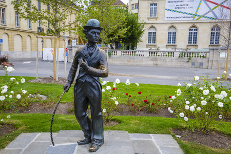 VEVEY, SWITZERLAND - SEPTEMBER 12, 2015: Statue of Charlie Chaplin one of the most creative talents in the era of silent movies, on the promenade reminds passers-by his 25-year stay in Vevey