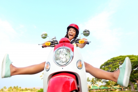 17699300-funny-happy-free-woman-on-scooter-driving-excited-and-cheerful-mixed-race-asian-chinese--caucasian-g.jpg?ver=6