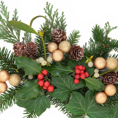 christmas greenery decoration with gold baubles holly ivy mistletoe and pine cones over - Christmas Greenery christmas greenery decoration with gold baubles holly ivy mistletoe and pine cones over - Christmas Greenery