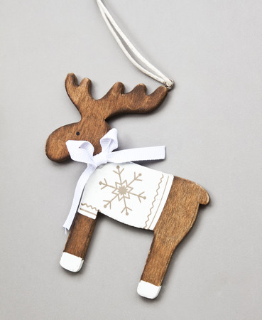 stock photo vintage wooden reindeer christmas decoration on grey background - Wooden Deer Christmas Decorations stock photo vintage wooden reindeer christmas decoration on grey background - Wooden Deer Christmas Decorations