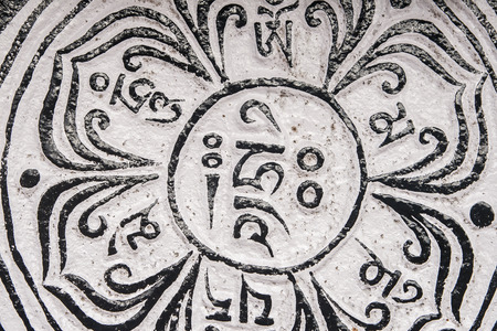 Chaurikharka, nepal - circa october 2013: mani stones with the inscription mantra is one of the elements of the buddhist religion circa october 2013 in chaurikharka.