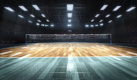 Empty professional volleyball court in lights
