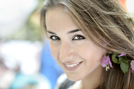 Beautiful girl in positano on the amalfi posing in the street with fashion clothes