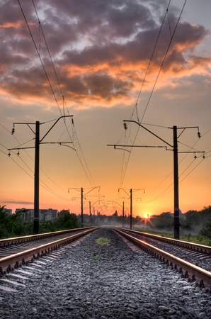 Railway way on sunset of a sun Фото со стока