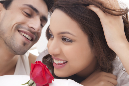 close up of couple romancing in bed stock photo picture and royalty