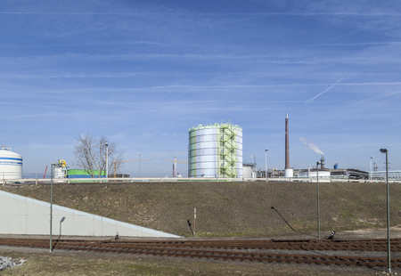 Frankfurt, germany - mar 6, 2013: industry park in frankfurt hoechst with tank under blue sky
