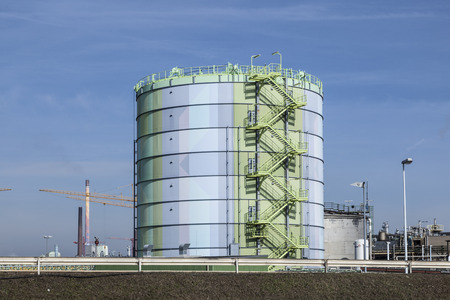 Frankfurt, germany - mar 6, 2013: industry park in frankfurt hoechst with tank under blue sky Stock Photo