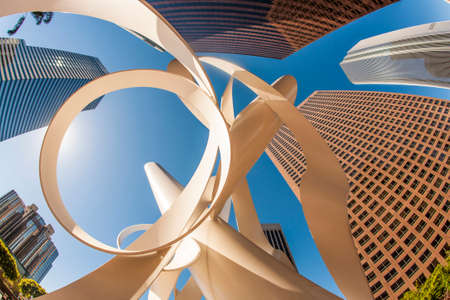 Los angeles, usa - june 27, 2010: perspective of skyscraper kpmg tower and deloitte and touche building downtown los angeles. the architecture in bunker holl district was finished late last century. Stock Photo