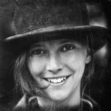 Woman like Charlie Chaplin with bowler. Vintage Pictur Stock Photo