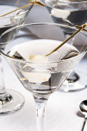 neat martini with pearl onion garnish stock photo picture and