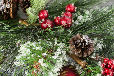 close up of christmas tree decoration with pine cones berries and ice stock photo - Christmas Tree With Pine Cones close up of christmas tree decoration with pine cones berries and ice stock photo - Christmas Tree With Pine Cones
