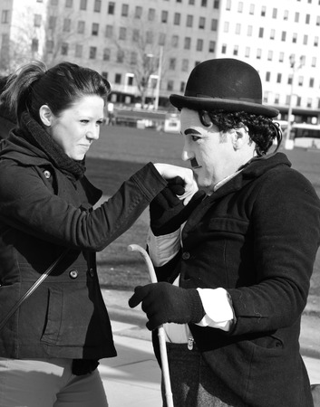 LONDON, UK - MARCH 5, 2011: Charlie Chaplin entertains tourists on the streets of London