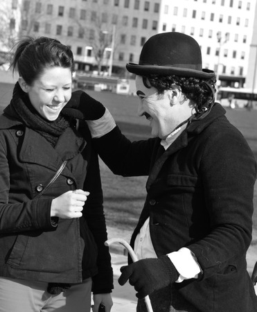 LONDON, UK - MARCH 5, 2011: Charlie Chaplin entertains tourists on the streets of London