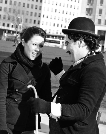 LONDON, UK - MARCH 5, 2011: Charlie Chaplin entertains tourists on the streets of London