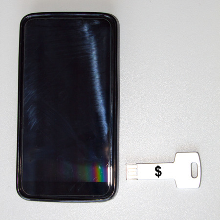 mobile and key pendrive with the dollar sign - 60847392