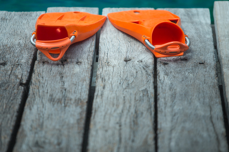 125575107-orange-flippers-for-diving.jpg?ver=6