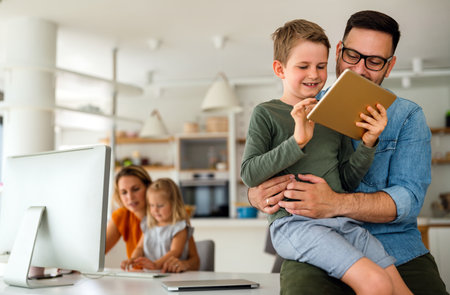 Device technology family online education concept. happy family with digital devices at home. Device technology family online education concept. happy family with digital devices at home.