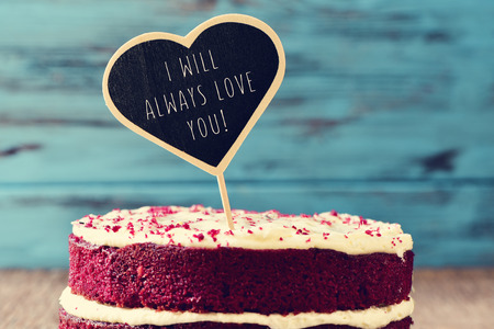 Closeup Of A Red Velvet Cake Topped With Heart Shaped Chalkboard The Text Closeup Of A Red Velvet Cake Topped With Heart Shaped Chalkboard The Text