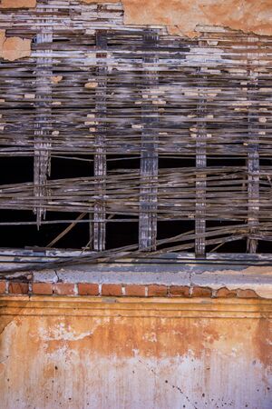 Old house along walking street(Chai Khong Road) in Chiang Khan,Loei,Thailand.Close-up the wall.