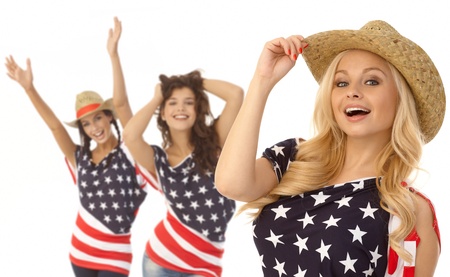 アメリカでポーズをとってセクシーな若いアメリカ人女の子 T シャツをフラグ 髪 手を幸せな笑顔します の写真素材 画像素材 Image