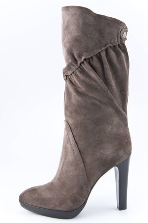 Botas De Ante De Color Beige De La Mujer En Un Alto única Botas De Ante De Color Beige De La Mujer En Un Alto única