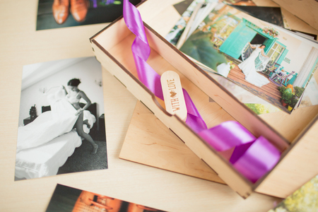 Original gift present beautiful wedding photobook and usb flash drive in vintage handmade wooden box wedding concept wooden flash drives for photos