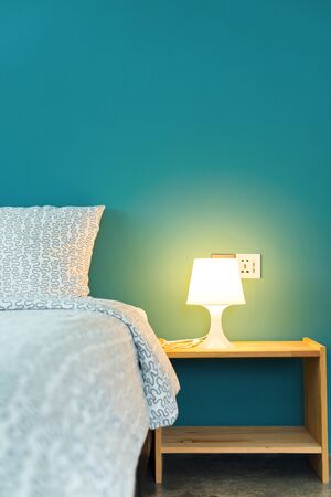 Pillow On Head Of Bed And The Included Lamp On Table Lights A