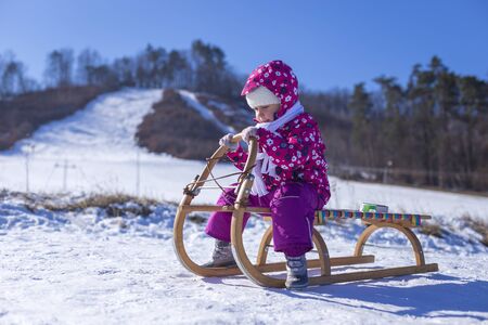 outdoor fun for family christmas vacation little girl enjoying a sleigh ride child sledding children play outdoors in snow - Christmas Vacation Sled outdoor fun for family christmas vacation little girl enjoying a sleigh ride child sledding children play outdoors in snow - Christmas Vacation Sled
