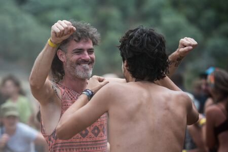 Two Men Dance On The Main Stage Of The Psytrance Lost Theory