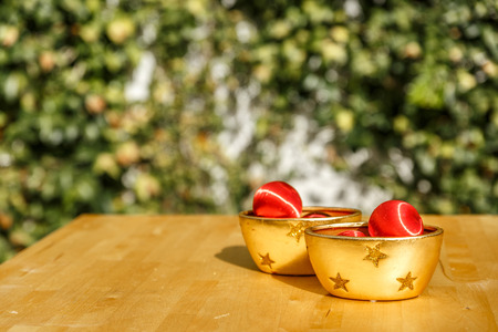 Red Christmas Balls And Yellow Decorative Bowls On A Wooden Table New Decorative Bowls And Balls Red Christmas Balls And Yellow Decorative Bowls On A Wooden Table New Decorative Bowls And Balls