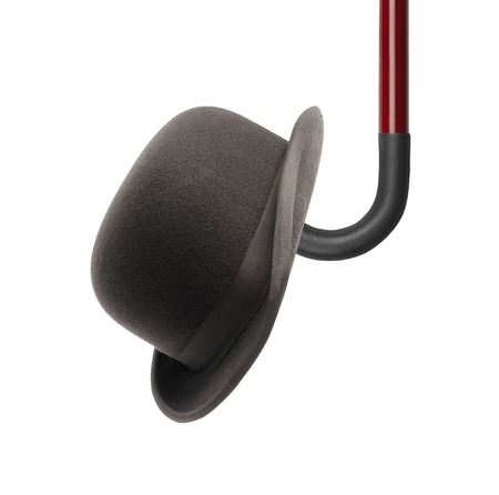 walking stick and black bowler cap