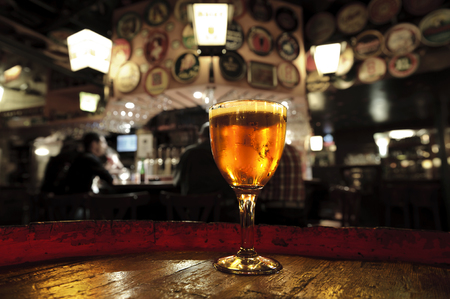Glass of fresh beer. Delirium bar Brussels