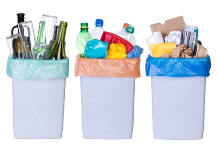 Recycling rubbish tree bins full of plastic paper and glass isolated on white background