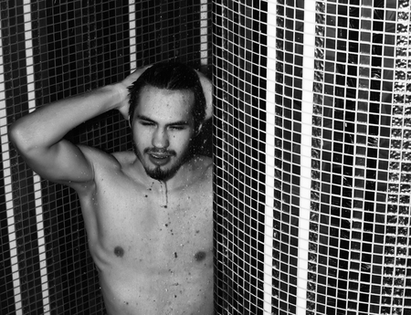 Handsome Muscular Sexy Man Washes In Shower Stock Photo Handsome Muscular Sexy Man Washes In Shower Stock Photo