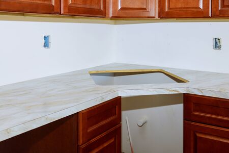 Installing A New Laminate Kitchen Counter Top Stock Photo Picture