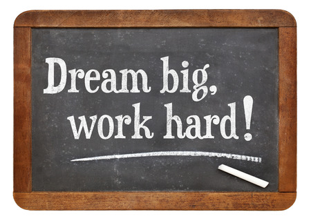 dream big work hard motivational words on a vintage slate