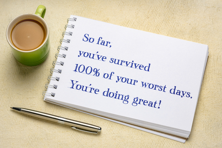 so far, you have survived 100% of your worst days. You are doing great. Positive handwriting in a spiral sketchbook with a cup of coffee