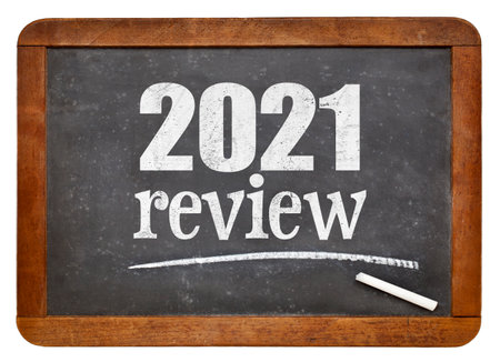 2021 review - annual review or summary of the recent year on an isolated vintage slate blackboard