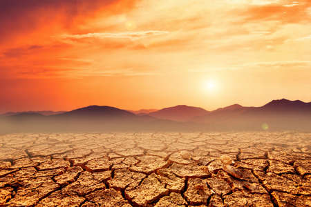 The land is cracked, the rain does not fall in season there was a drought due to global warming. concept of change and global warming