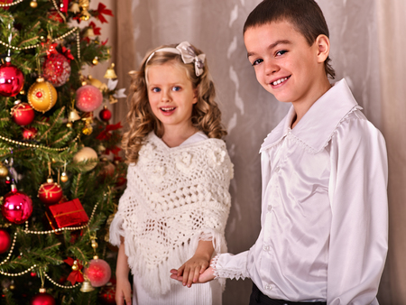children receiving gifts under christmas tree black and white retro brother and sister home - Home Alone White Christmas children receiving gifts under christmas tree black and white retro brother and sister home - Home Alone White Christmas
