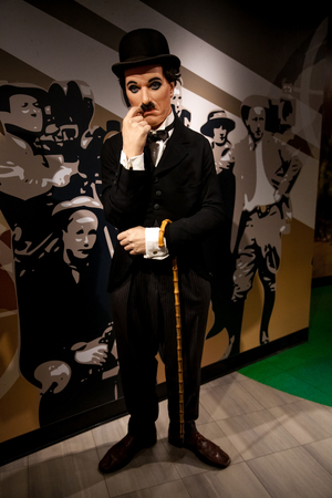 Amsterdam, Netherlands - March, 2017: Wax figure of Sir Charles Spencer Charlie Chaplin, English comic actor in Madame Tussauds Wax museum in Amsterdam, Netherlands
