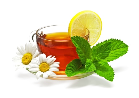 tea in cup with leaf mint, lemon and chamomile